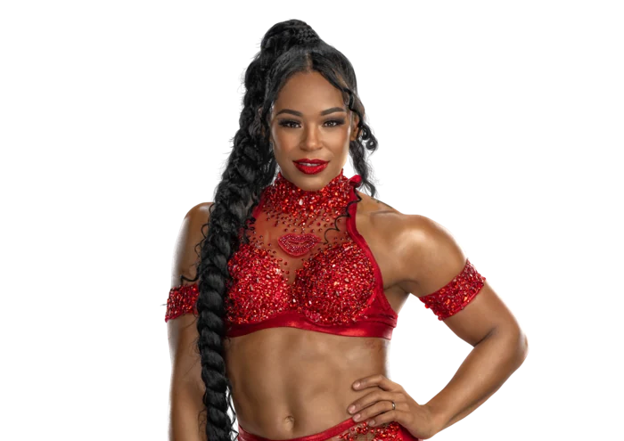 Bianca Belair in bright ring gear with her signature braid
